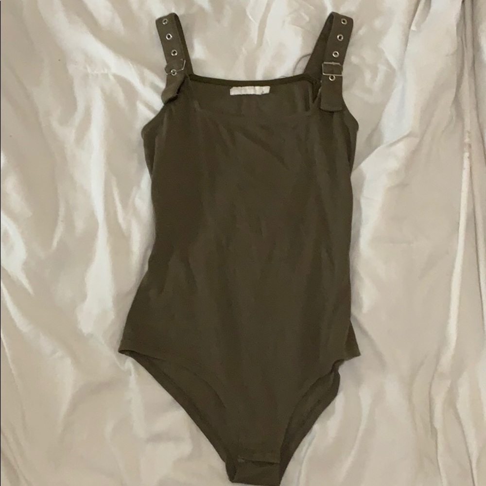Buckle strap bodysuit